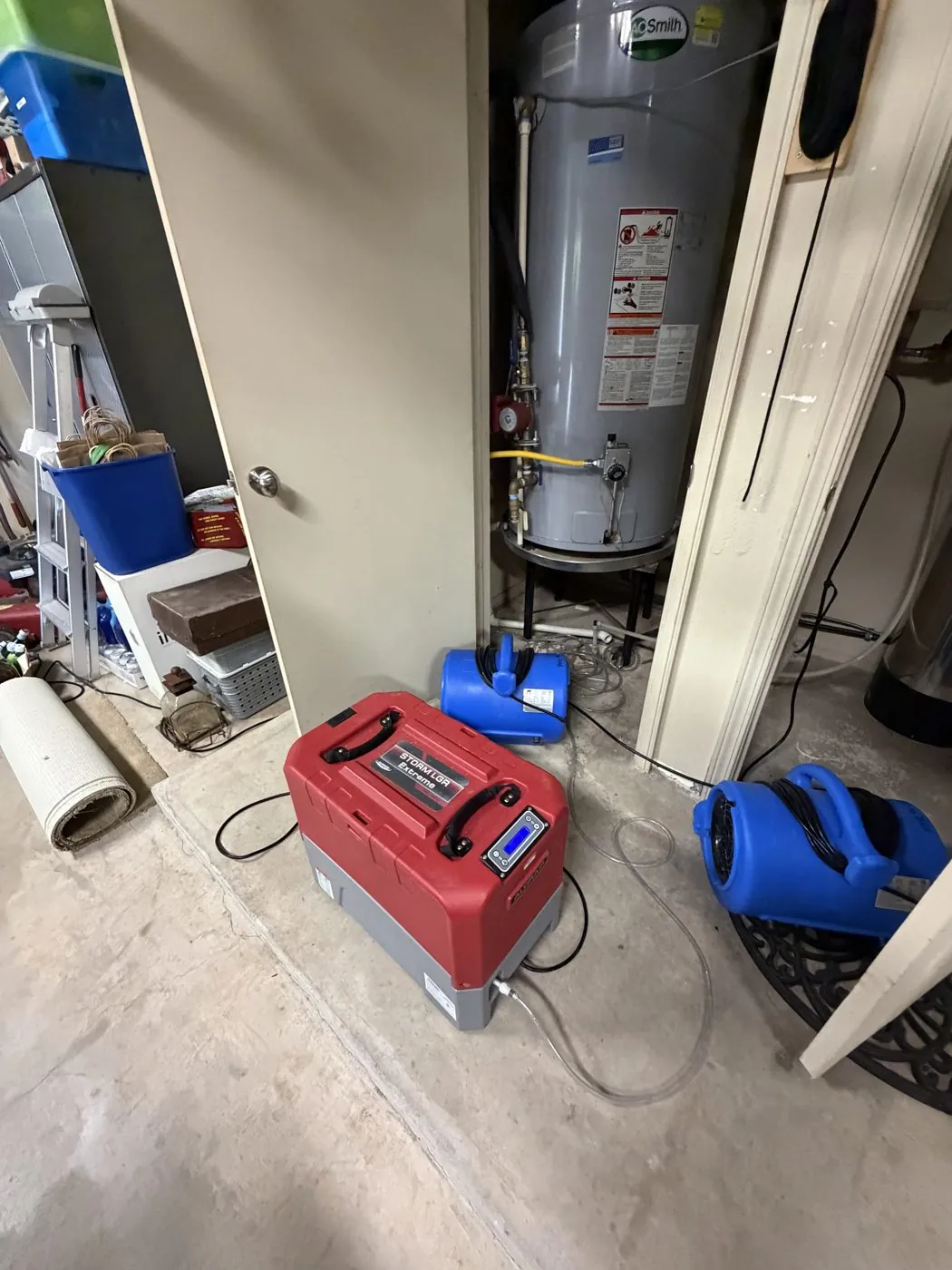 Water heater closet leak being dried on a Nitro job